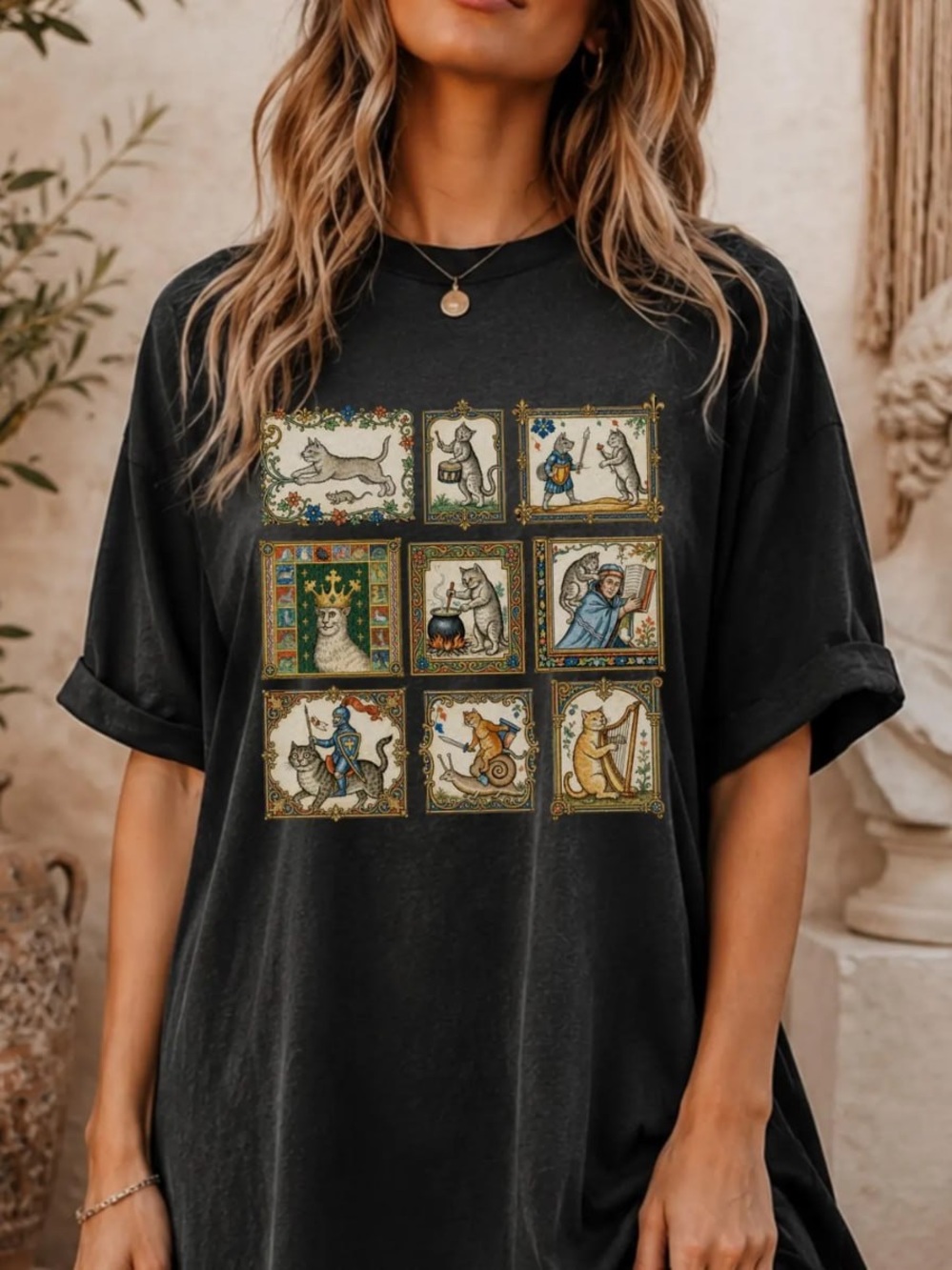 Vintage-Inspired Black Graphic Tee with Storybook Cat Panels